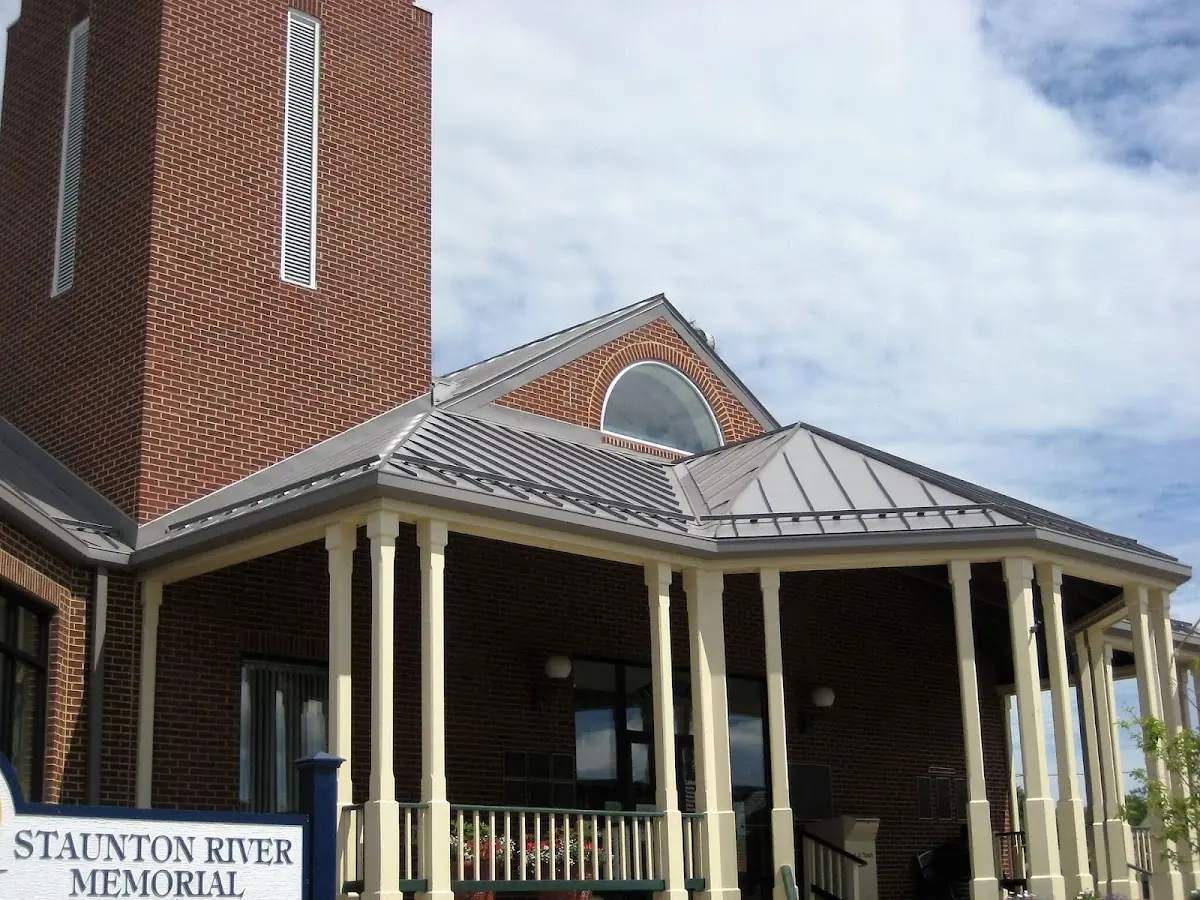 Skilled roofing craftsmen working on a residential roof in Mishawaka